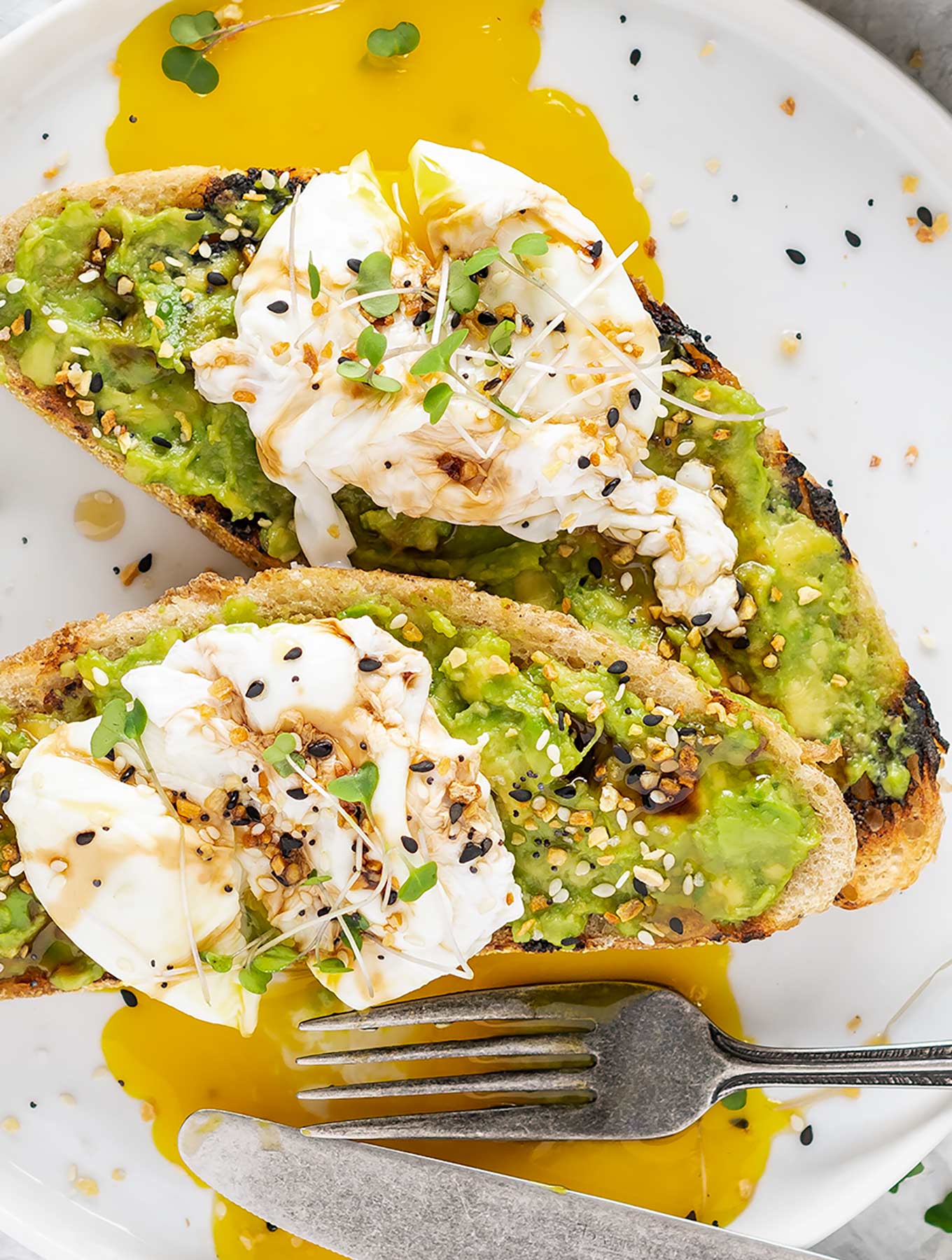 Avocado toast with poached eggs on sourdough